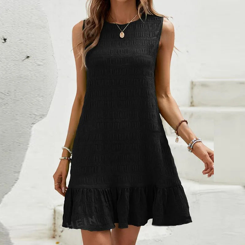 Milena - Elegante minivestido sin mangas con volante en el dobladillo