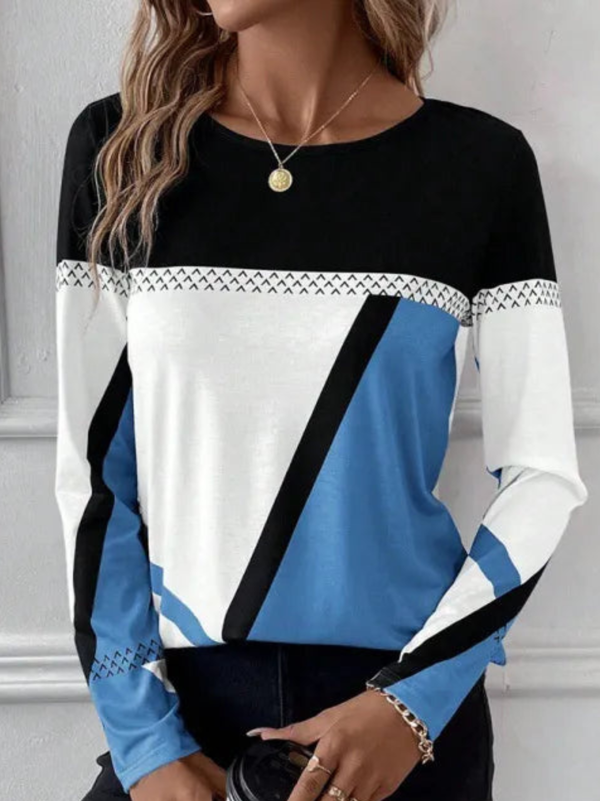 Cathryn - Elegante blusa de manga larga en bloques de color