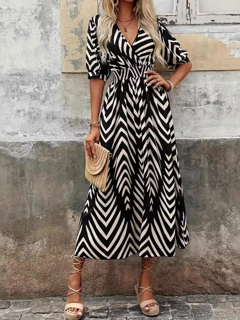 Sarah - Elegante vestido con escote en pico y estampado geométrico