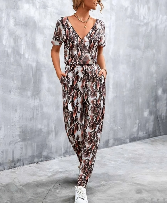 Olivette - Elegante mono estampado con cuello en V profundo