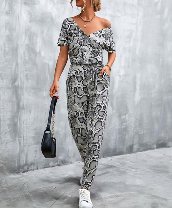 Olivette - Elegante mono estampado con cuello en V profundo