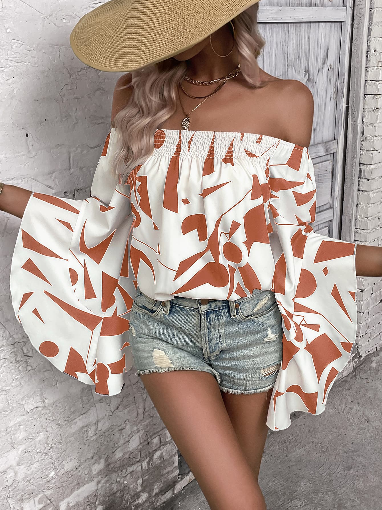 Bianca - Elegante blusa con hombros descubiertos y manga murciélago