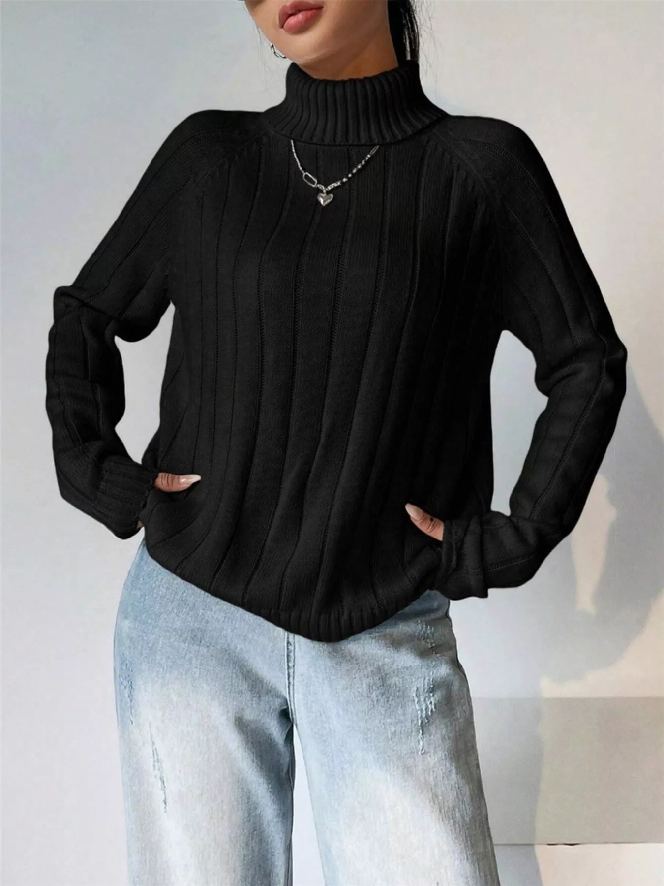 Kaila - Elegante jersey de manga larga con cuello alto y canalé
