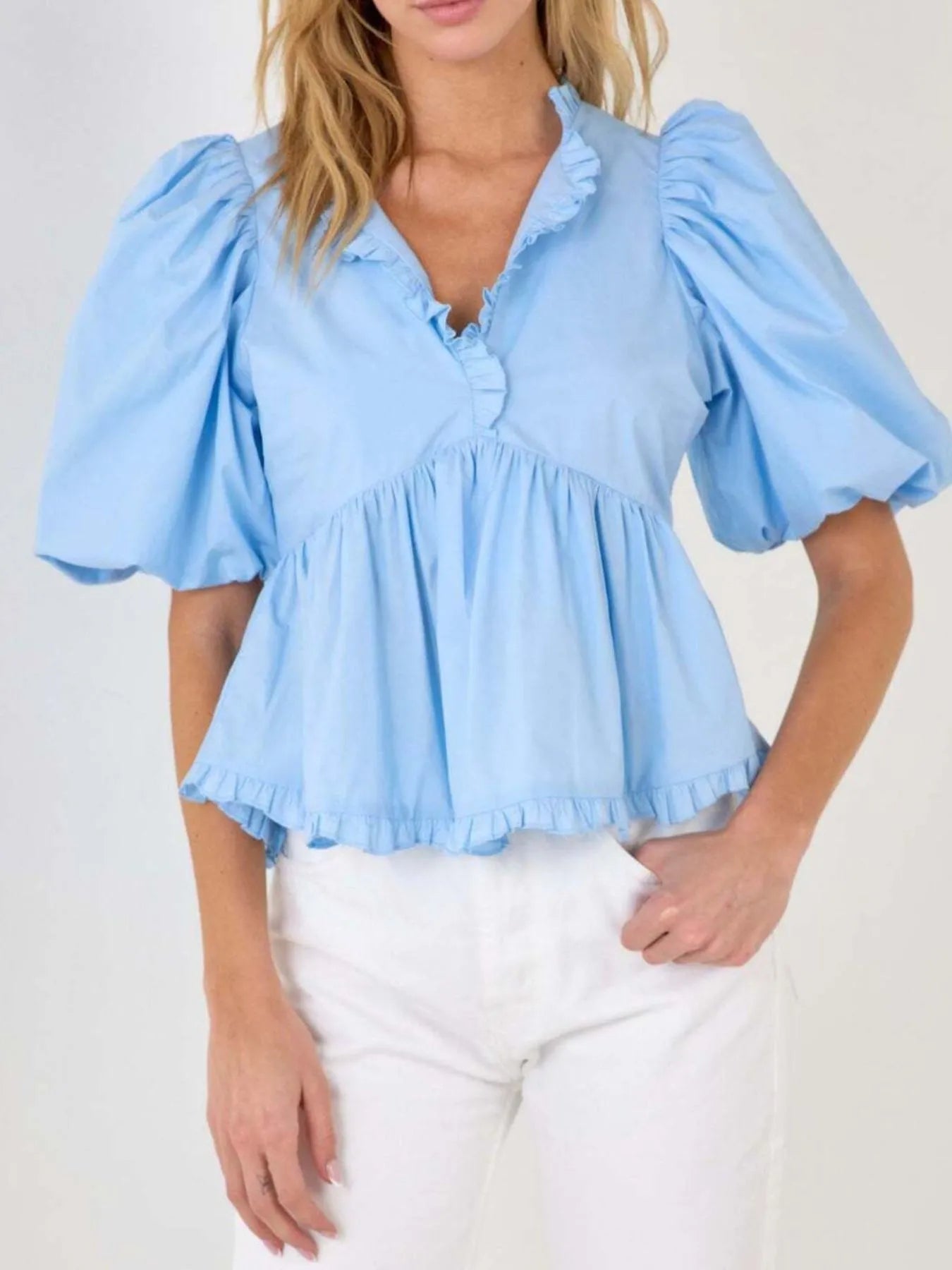 Kath - Elegante blusa peplum con mangas abullonadas