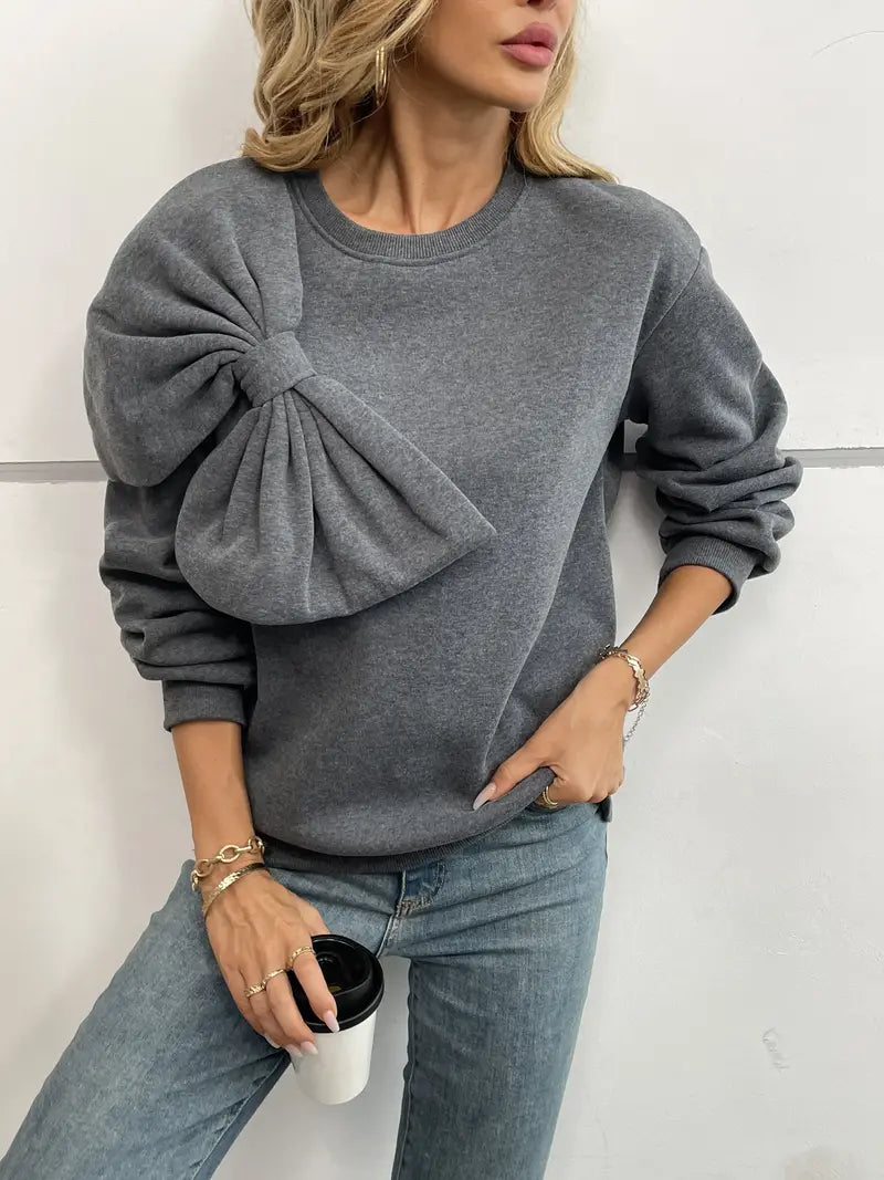 Benia – Suéter elegante con un gran lazo