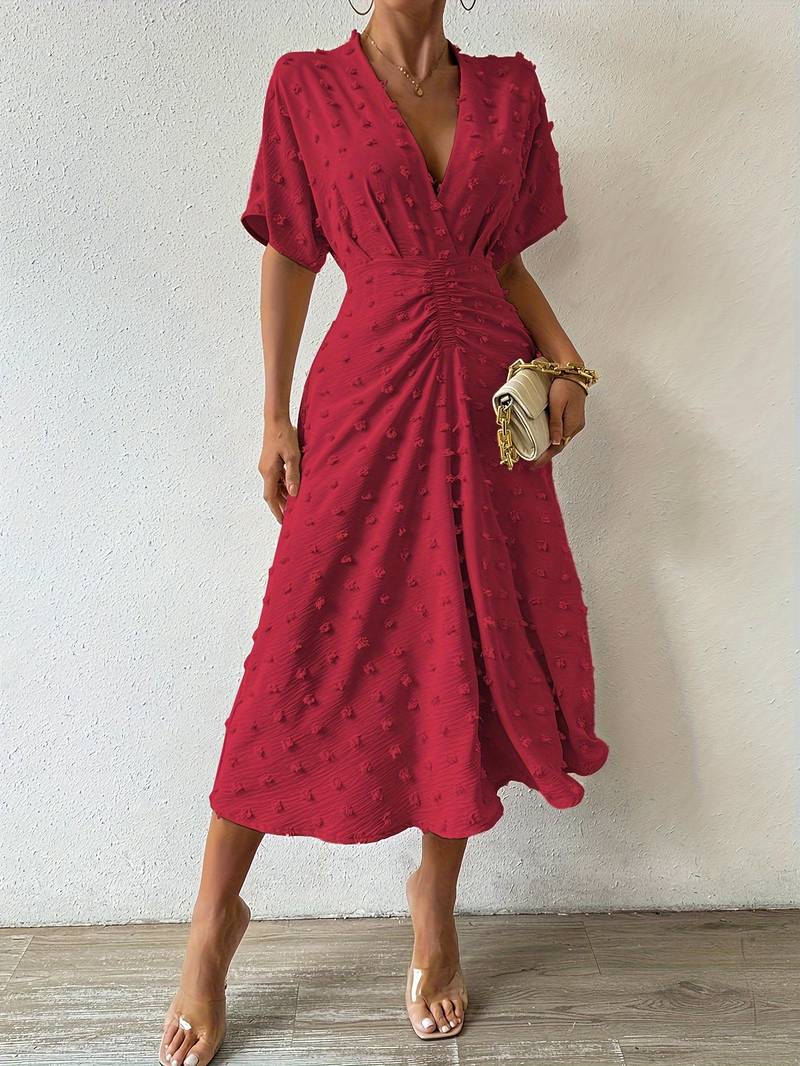 Janelle - Elegante vestido con volante de lunares suizos