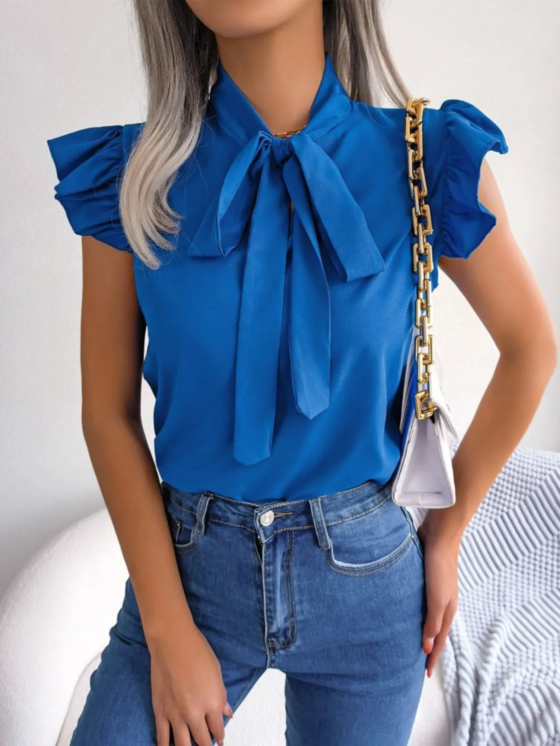 Marielle - Blusa con volantes y pajarita