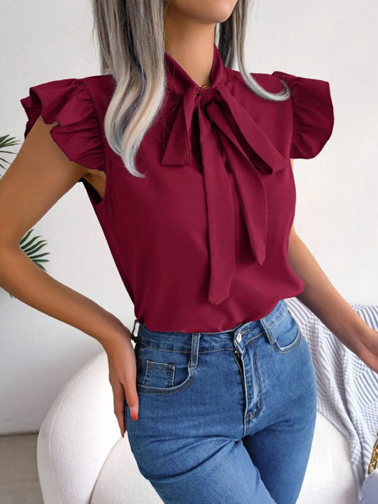 Marielle - Blusa con volantes y pajarita
