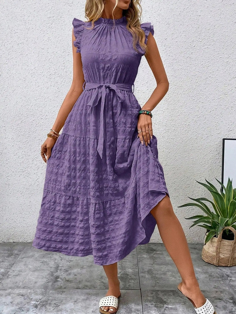 Denise - Elegante vestido con cinturón y volantes