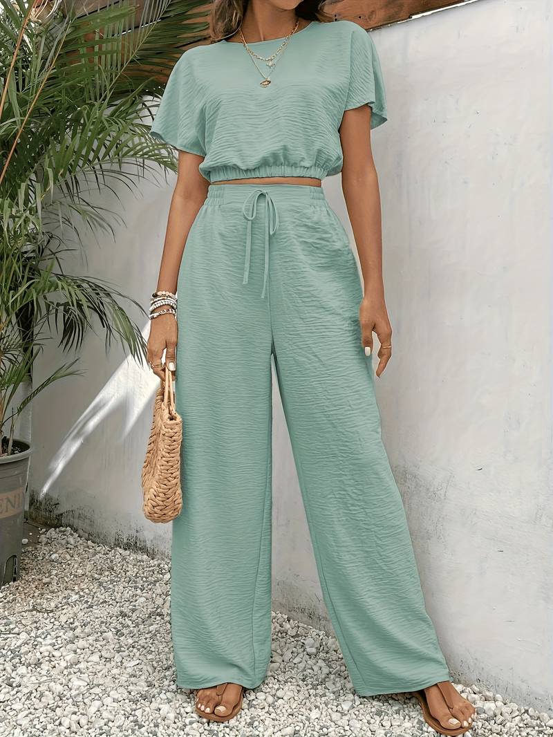 Eleanora - Camiseta crop top chic y pantalón de cintura alta