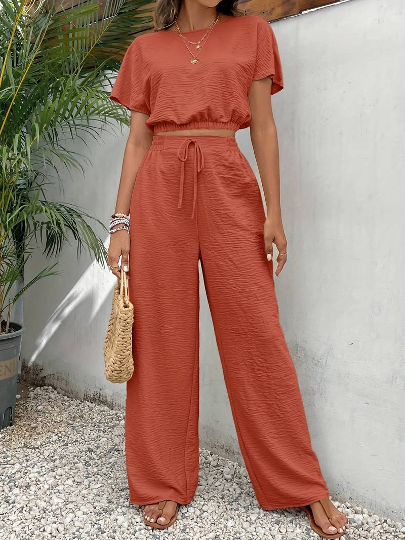Eleanora - Camiseta crop top chic y pantalón de cintura alta
