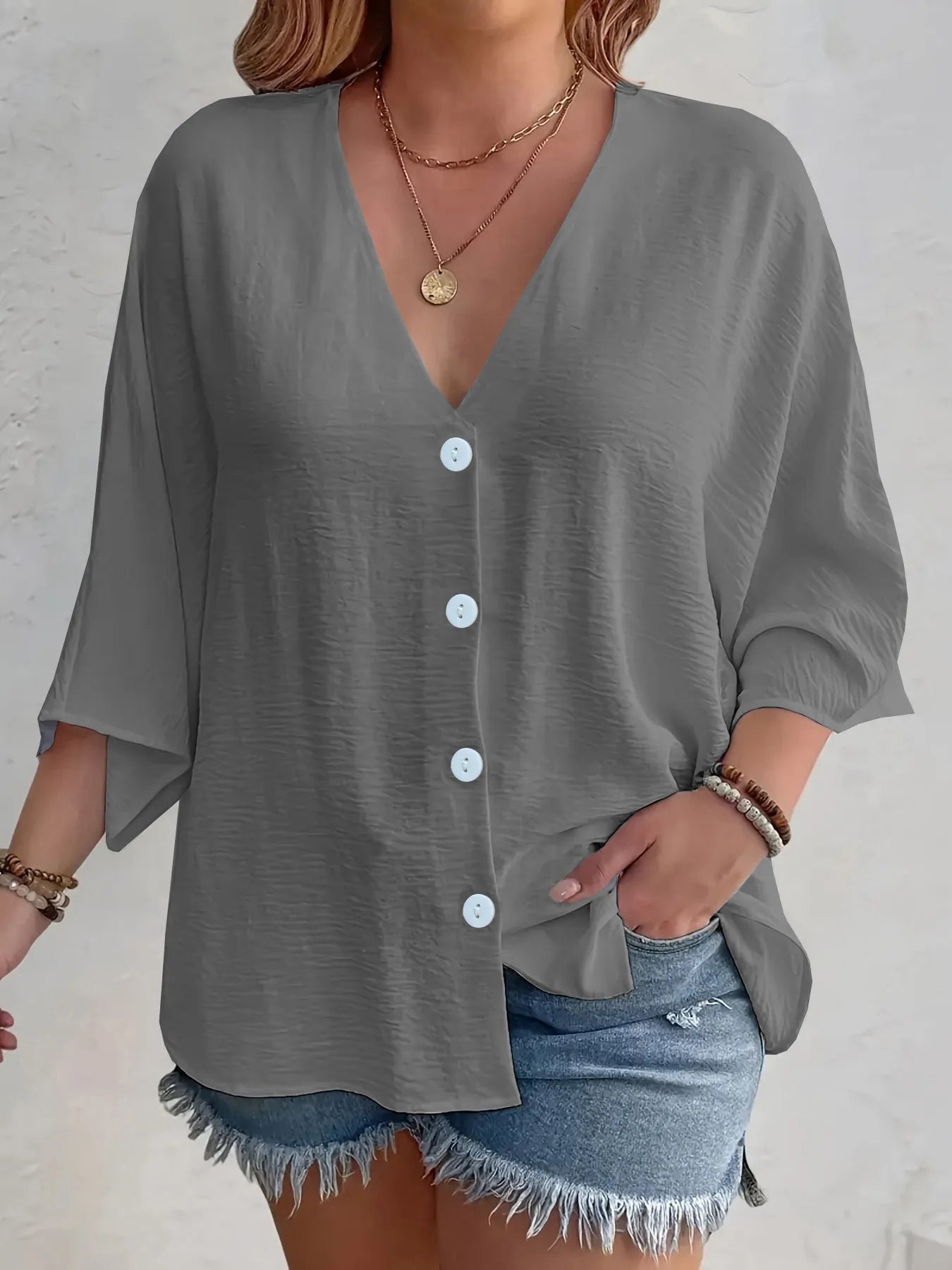 Amirah - Blusa casual suelta de media manga con cuello en V y botones
