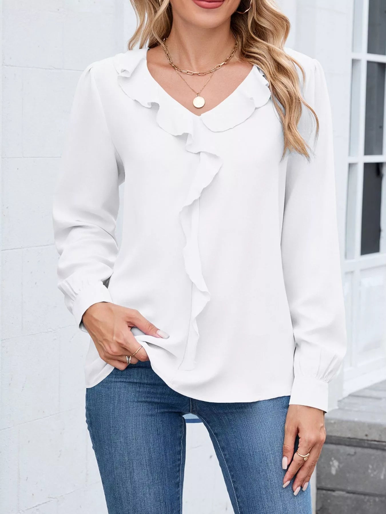 Zerlina - Elegante blusa de manga larga con cuello en V y volantes