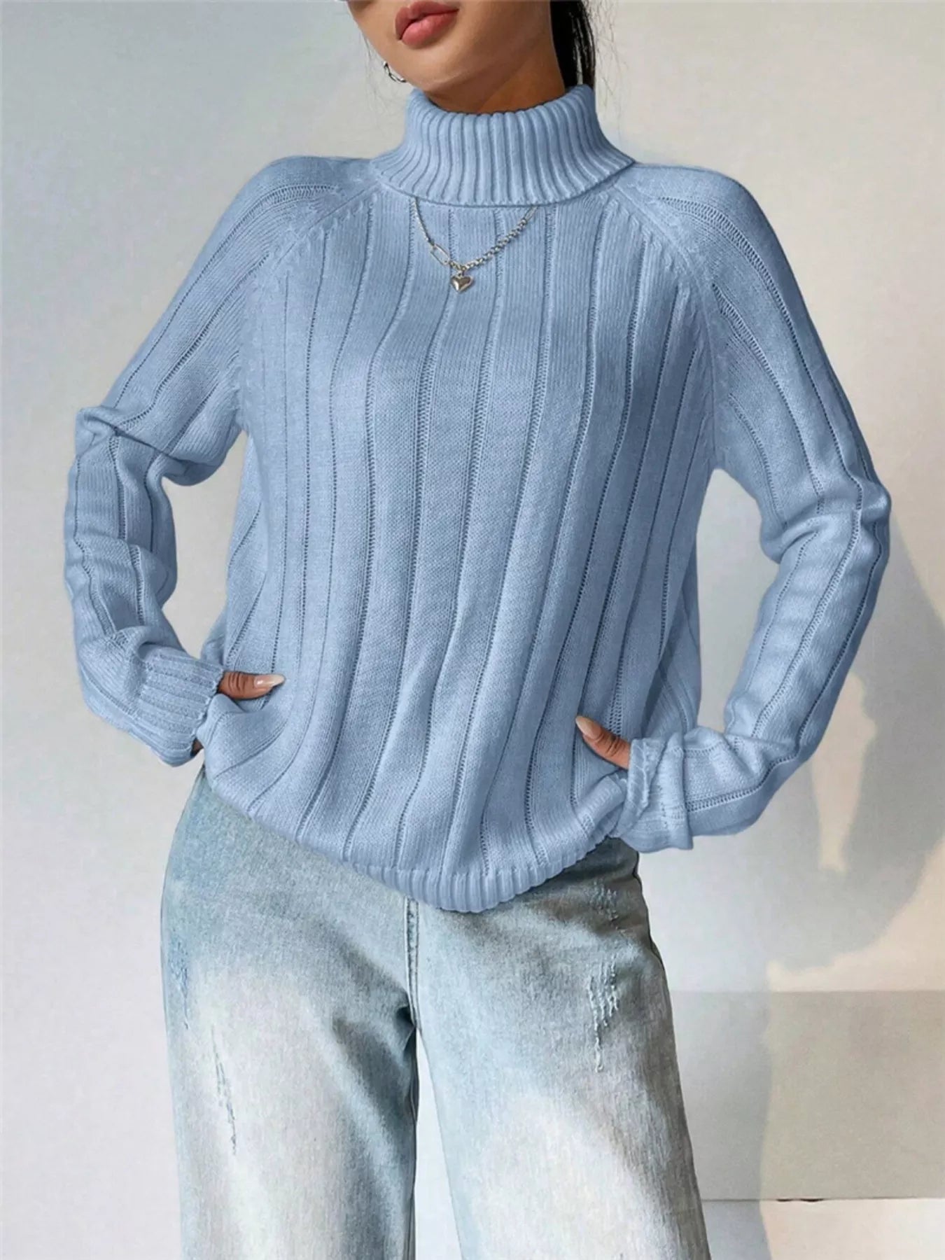 Kaila - Elegante jersey de manga larga con cuello alto y canalé