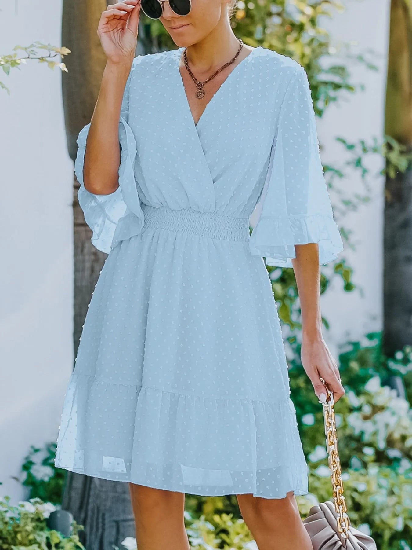 Kelsey - Elegante mini vestido de lunares suizos con mangas acampanadas